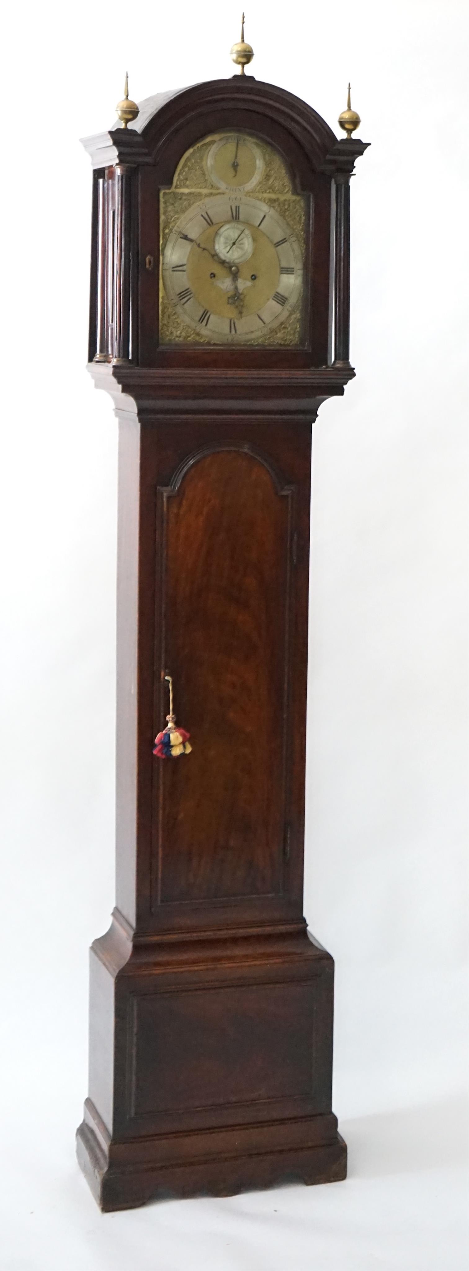 Thomas Garner of London, a George III mahogany eight day longcase clock, the arched brass dial with silvered strike / silent, Roman chapter ring, subsidiary seconds and date aperture, five pillar movement with anchor esc